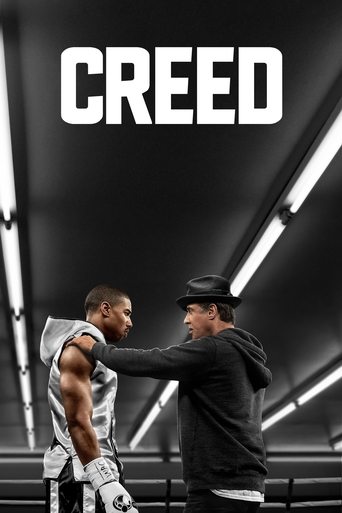 The poster features two men in a boxing ring, one in a white tank top and the other in a black hoodie, set against a dark, industrial background with bright fluorescent lights. The bold "CREED" text dominates the top, conveying a gritty, intense atmosphere that hints at the film's gritty and inte...