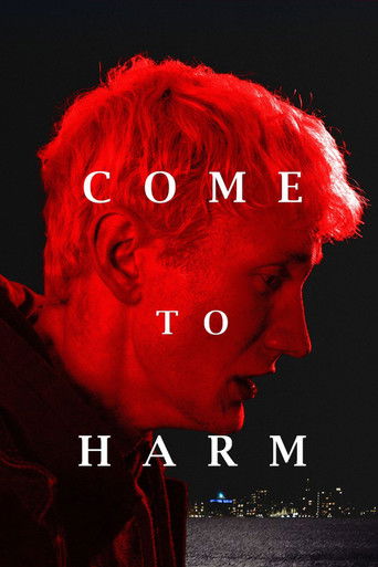 The poster features a close-up of a man with spiky, reddish hair, bathed in a dramatic red hue against a dark background. The title "COME TO HARM" is prominently displayed in white, creating a stark contrast that emphasizes the ominous tone. The overall mood is intense and foreboding, suggesting ...