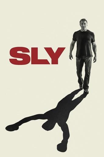 The poster features a man standing atop a shadowed figure, with the title "SLY" in bold red letters. The dark silhouette contrasts sharply against the light background, creating a mysterious and suspenseful mood.