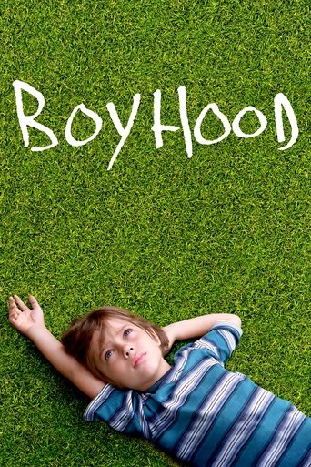 The poster features a young boy lying on a vibrant green lawn, his head tilted back and eyes closed in a peaceful, dreamy pose. The title "Boyhood" is elegantly written in white script against the lush grass, evoking a sense of innocence and nostalgia.