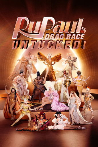 The poster features a vibrant, golden backdrop with a spotlight effect. RuPaul and his drag queens are arranged in a dynamic composition, exuding confidence and charisma. The warm lighting and rich colors create an energetic and glamorous atmosphere, highlighting the show's focus on talent and cr...