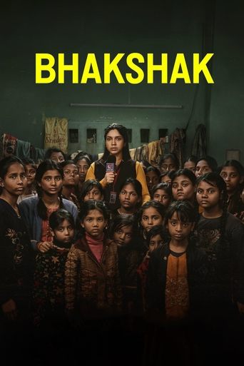 The poster features a somber group of children and adults in dimly lit, gritty settings. The muted tones and shadowy figures evoke a sense of hardship and resilience. The bold yellow title "Bhakshak" stands out against the dark background, symbolizing hope and the enduring spirit of the community.