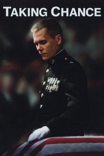 The poster features a soldier in a military uniform, looking solemnly at an American flag draped over his shoulder. The dark background contrasts with the bright red and white stripes, creating a dramatic and respectful atmosphere.