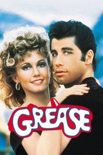 The poster features a glamorous blonde woman and a dark-haired man in an intimate embrace, with the bold "GREASE" title in red and white. The warm lighting and romantic pose evoke a nostalgic, sweet mood.
