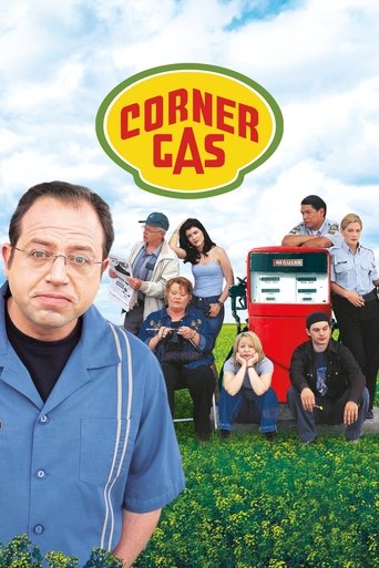 The poster features a man in a blue shirt in the foreground, with a group of people posing in a field behind him. The background includes a red gas station and a cloudy sky. The overall mood is casual and relaxed.