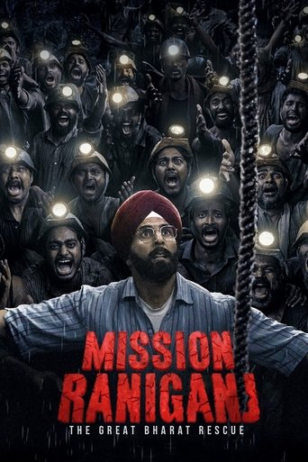 The poster depicts a dark, ominous scene with a man in a red turban and blue shirt at the center, surrounded by terrified faces illuminated by flickering lights. The title "Mission Raniganj" is prominently displayed in bold red letters, evoking a sense of urgency and danger. The overall mood is t...