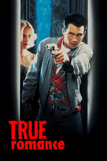 The poster features a man in a gray jacket holding a gun, with a woman peeking from behind him, creating an intense and suspenseful mood. The bold red text "TRUE ROMANCE" stands out against the dark background, emphasizing the film's dramatic and romantic undertones.