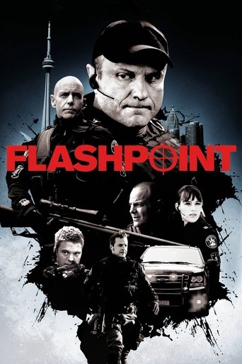 The poster features a gritty, high-stakes scene with a central character in a tactical hat, surrounded by other armed individuals in dark, intense lighting. The bold red "FLASHPOINT" text dominates the center, creating a dramatic and urgent atmosphere. The composition suggests action, conflict, a...