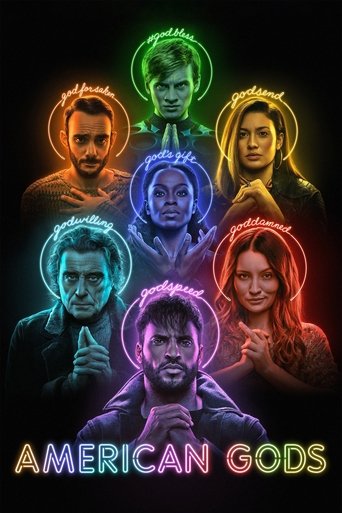 This poster features seven luminous, glowing figures of the American Gods set against a dark background, creating an otherworldly and mystical atmosphere. The vibrant neon colors and ethereal glow evoke a sense of mystery and spiritual connection, inviting viewers into a world of ancient mytholog...