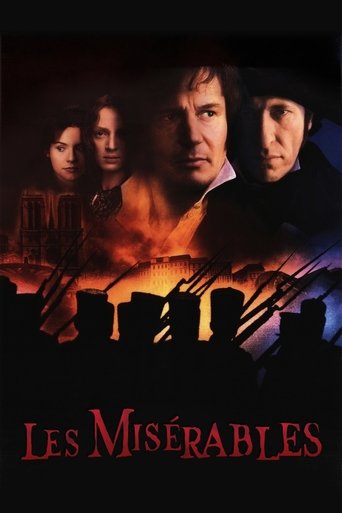 The poster features four characters against a dramatic backdrop of fiery orange and dark tones, evoking a sense of urgency and danger. The title "Les Misérables" is prominently displayed in bold red letters at the bottom, suggesting themes of hardship and moral struggle.
