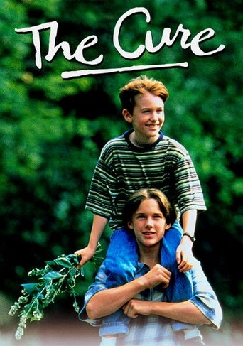 The Cure poster features a young boy in a striped shirt carrying a young girl in a blue shirt, both smiling against a lush green backdrop. The warm lighting and vibrant colors evoke a nostalgic, hopeful mood.