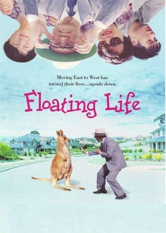 This movie poster features a nostalgic scene with a man and dog on a sunny day, evoking warmth and connection. Above, a collage of faces suggests memories or dreams. The soft pastel colors and serene atmosphere create a dreamlike mood, hinting at themes of love and family.
