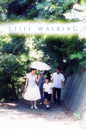 The poster features a family of four walking along a sun-dappled path, with the woman holding an umbrella and the man beside her. The lush greenery and warm sunlight create a serene, nostalgic atmosphere, evoking a sense of timeless connection and gentle movement.