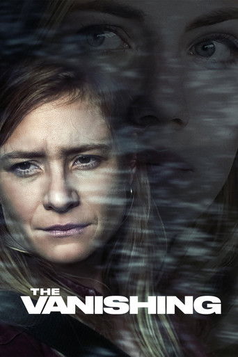 The poster features a woman with a somber expression, her face partially obscured by a translucent, ghostly overlay that suggests mystery or horror. The muted, dark tones of the image convey a sense of unease and suspense, while the title "THE VANISHING" in bold white letters adds to the eerie at...
