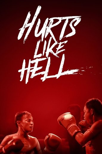 The poster features two boxers in a tense, intense moment against a deep red background. The bold, distressed white text "Hurts Like Hell" dominates the upper portion, conveying a gritty, dramatic atmosphere. The image captures the raw energy and emotional weight of boxing, suggesting a story fil...