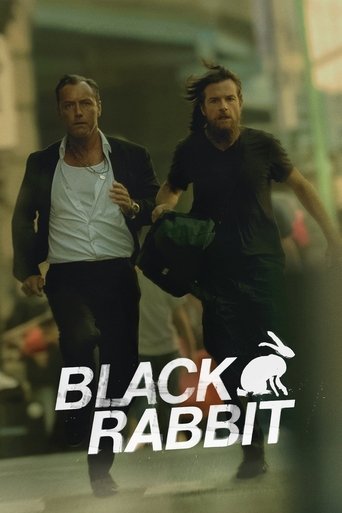 The poster features two men in urban settings, one in a suit and the other in casual attire, suggesting a gritty, action-packed narrative. The muted tones and shadowy figures evoke a sense of mystery and tension, while the bold white text "BLACK RABBIT" stands out against the desaturated background.