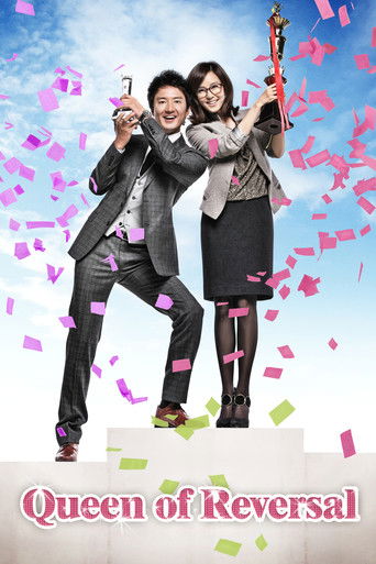 The poster features two women in formal attire celebrating a victory, with colorful confetti falling around them against a bright blue sky. The title "Queen of Reversals" is prominently displayed at the bottom in pink text. The overall mood is joyful and triumphant, capturing a moment of triumph ...