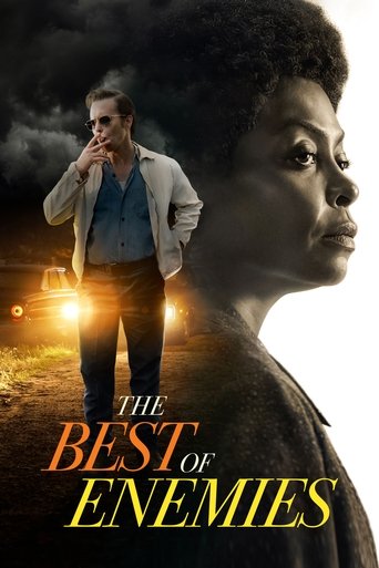 The poster features a dramatic scene with a man in a trench coat and a woman in a dark coat, both looking intently toward the viewer. The title "The Best of Enemies" is prominently displayed in bold, fiery red and gold lettering against a dark, stormy sky. The overall mood is intense and dramatic...