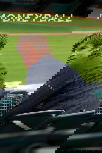 A young baseball player with a determined expression sits on a green bench, looking off into the distance. The poster features the title "Moneyball" in bold yellow letters against a blurred baseball field backdrop. The mood is gritty and focused, capturing the essence of a player making a tough c...