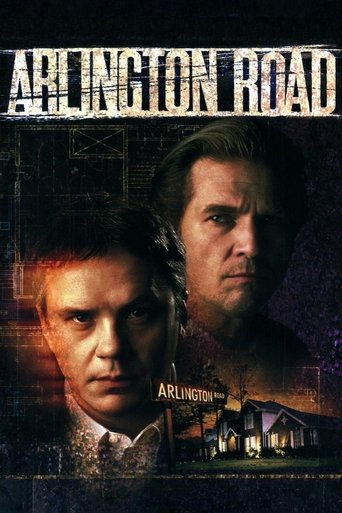 The poster features two men in a somber, noir-style setting with muted tones and a gritty atmosphere. The title "Arlington Road" is prominently displayed at the top, evoking a sense of mystery and tension.