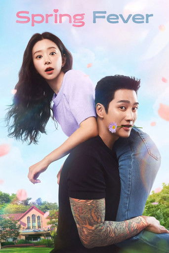 The poster features a man with tattoos carrying a woman on his shoulders, set against a dreamy spring scene with pink blossoms and a charming house. The mood is whimsical and romantic, capturing the essence of a lively summer love story.
