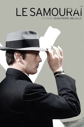 The poster features a man in a sharp black suit and a stylish gray fedora, holding a white document. The muted gray background contrasts with his dark attire, creating a mysterious and dramatic mood. The title "LE SAMOURAÏ" is prominently displayed at the top, suggesting a classic French adventure.