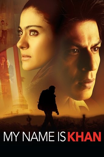 The poster features a dramatic scene with two characters in intense expressions, set against a warm, golden background. A silhouette of a person walks toward the viewer, adding depth and mystery. The title "My Name Is Khan" is prominently displayed in bold, contrasting colors. The overall mood is...