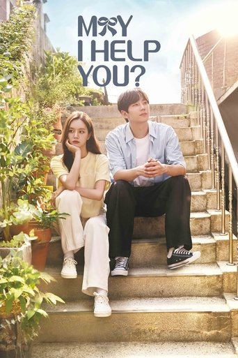 The poster features two young people sitting on stone steps outdoors, with one girl in a yellow top and white pants, and a boy in a blue shirt and dark pants. The scene is bathed in soft natural light, creating a warm, inviting atmosphere. The title "May I Help You?" is prominently displayed at t...