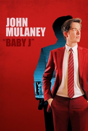 The poster features John Mulaney in a striking red suit against a bold red background, with a shadow of the same figure looming behind him. The title "Baby J" is prominently displayed in white and red text. The mood is intense and dramatic, capturing the essence of the film's gritty storytelling.
