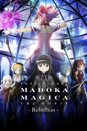 The poster features a dramatic scene with Madoka Magica at the center, surrounded by other magical characters in a fantasy setting. The colors are vibrant, with deep blues and purples creating a mysterious atmosphere. The mood is intense and magical, hinting at the epic nature of the film.