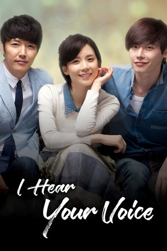 The poster features three young men and women in casual attire, with a warm, soft color palette of blues, whites, and soft browns. The mood is intimate and nostalgic, capturing a moment of connection between the characters. The title "I Hear Your Voice" is elegantly written in white script at the...