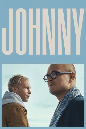 The poster features a man in glasses and a blue scarf, looking thoughtfully at another man with short blonde hair wearing a brown jacket. The muted blue background and soft lighting evoke a contemplative mood, suggesting a narrative about connection and understanding.