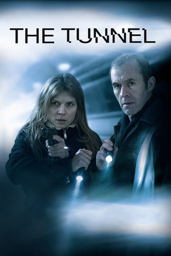 The poster features two characters in a dimly lit tunnel, with one holding a flashlight. The cool blue and black tones create a suspenseful, mysterious atmosphere, emphasizing the thriller genre.