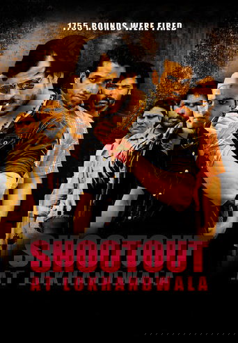 The poster features a gritty, intense scene with a central actor in a black shirt holding a microphone, surrounded by other men in various outfits. The warm, dramatic lighting and bold red text convey a serious, action-packed atmosphere.