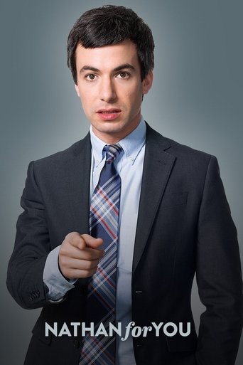 The poster features a man in a sharp suit and tie, pointing forward with a confident expression. The muted gray background contrasts with his professional attire, creating a serious yet engaging mood. The text "Nathan for You" is prominently displayed at the bottom, suggesting a comedic or satiri...