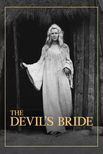 The poster features a ghostly figure in a long white gown standing in front of a rustic wooden door, evoking a spooky yet mysterious atmosphere. The title "The Devil's Bride" is prominently displayed in bold, golden letters, suggesting a supernatural romance with eerie undertones.