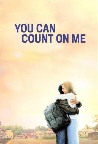 The poster features a young couple embracing warmly against a soft, golden sunset. The warm colors evoke a sense of hope and comfort, while the text "You Can Count on Me" in bold blue letters reinforces the message of emotional support.