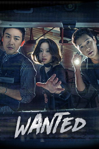 The poster features three characters with intense expressions against a gritty, industrial backdrop. The dark, moody lighting and muted tones create a suspenseful atmosphere, while the bold, distressed "WANTED" text at the bottom adds a sense of urgency and danger.