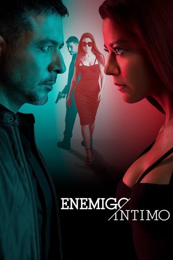 The poster features a dramatic confrontation between two intense male faces, one in shadow and one illuminated by red light. In the background, a woman in a red dress stands confidently, while another man looms behind her. The cool blue and warm red tones create a visually striking contrast, evok...