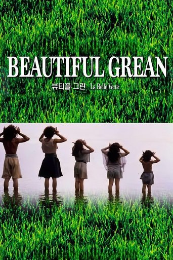 The poster features silhouettes of young girls standing in a serene, misty field, their hands raised in a gesture of wonder or contemplation. The lush green grass in the foreground and background creates a vibrant, natural backdrop that evokes a sense of peace and innocence. The title "La Belle V...