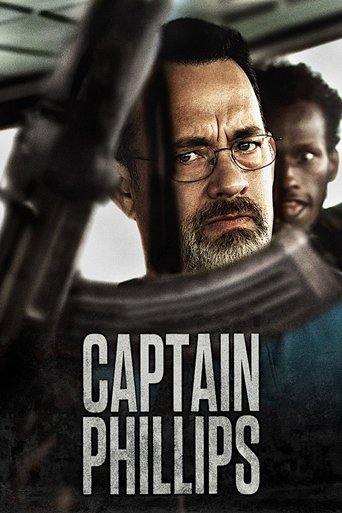 The poster features a gritty, moody scene with a man in glasses and a beard, his expression serious and intense, framed by the dark, industrial atmosphere of a ship's interior. The muted color palette of grays and blacks evokes a sense of tension and danger, while the bold, white text "CAPTAIN PH...