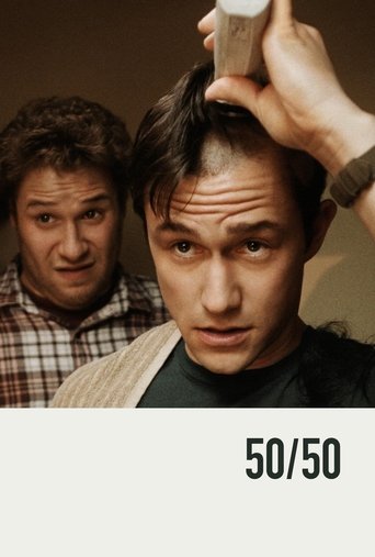 The poster features two men in a tense, dramatic pose against a warm, earthy background. The man in the foreground looks intensely at the camera, while the man behind him grins with visible tension. The color palette is muted, with browns, beiges, and soft skin tones, creating a gritty, realistic...