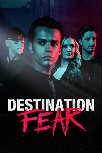 The poster features four characters in a dramatic, moody atmosphere with intense expressions. The lighting is split between cool blues and warm reds, creating a suspenseful and eerie mood. The title "DESTINATION FEAR" is prominently displayed in bold, stylized text, emphasizing the show's horror ...