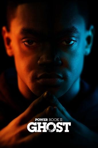 The poster features a close-up of a man with intense, piercing eyes, bathed in dramatic blue and red lighting that creates a mysterious and suspenseful atmosphere. The title "Power Book II: Ghost" is prominently displayed in bold white text at the bottom, emphasizing the supernatural thriller genre.