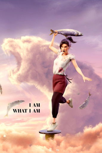 The poster features a woman balancing on a cloud, holding a fish aloft. The sky is filled with soft pink and purple hues, creating a dreamy atmosphere. The text "I AM WHAT I AM" is prominently displayed in the foreground, emphasizing the theme of self-discovery.