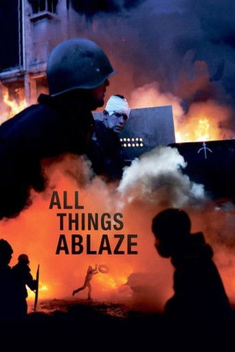 This movie poster depicts a chaotic scene with silhouettes of people amidst intense fire and smoke. The fiery orange and black colors convey urgency and danger, while the title "All Things Ablaze" suggests a dramatic and intense narrative. The overall mood is one of chaos and destruction.