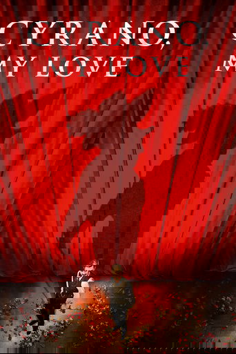 The poster features a man in a suit standing before a dramatic red curtain backdrop, with a shadow of a horseman looming above. The warm lighting and rich red tones evoke a sense of mystery and romance, while the scattered petals on the floor add a touch of whimsy.