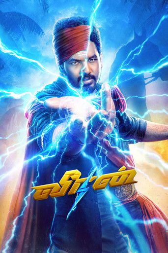 The poster features a muscular man in a red turban, channeling blue lightning energy from his hands. The vibrant colors of the electric blue and red create an intense, dynamic mood, suggesting action and power. The title "Veeran" is prominently displayed in bold, golden letters at the bottom.