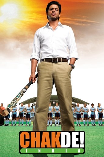 The poster features a confident man in a white shirt and khaki pants holding a cricket bat, standing against a vibrant sunset backdrop. Behind him, a crowd of cricket players in colorful uniforms cheers enthusiastically. The bold orange text "CHAKDE!" dominates the bottom, emphasizing the film's ...