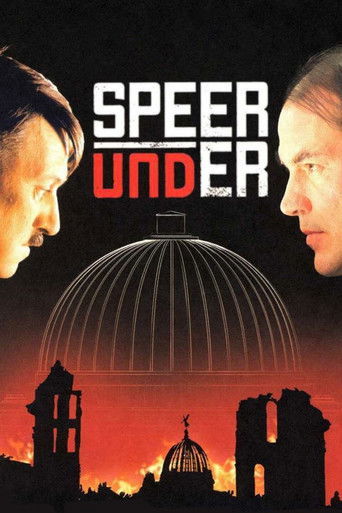The poster features a dramatic split between two men's faces, one on the left and the other on the right, set against a fiery sunset backdrop. The title "Speer & Hitler" is prominently displayed in bold, contrasting colors. A large, ominous dome looms in the center, symbolizing the threat of Nazi...